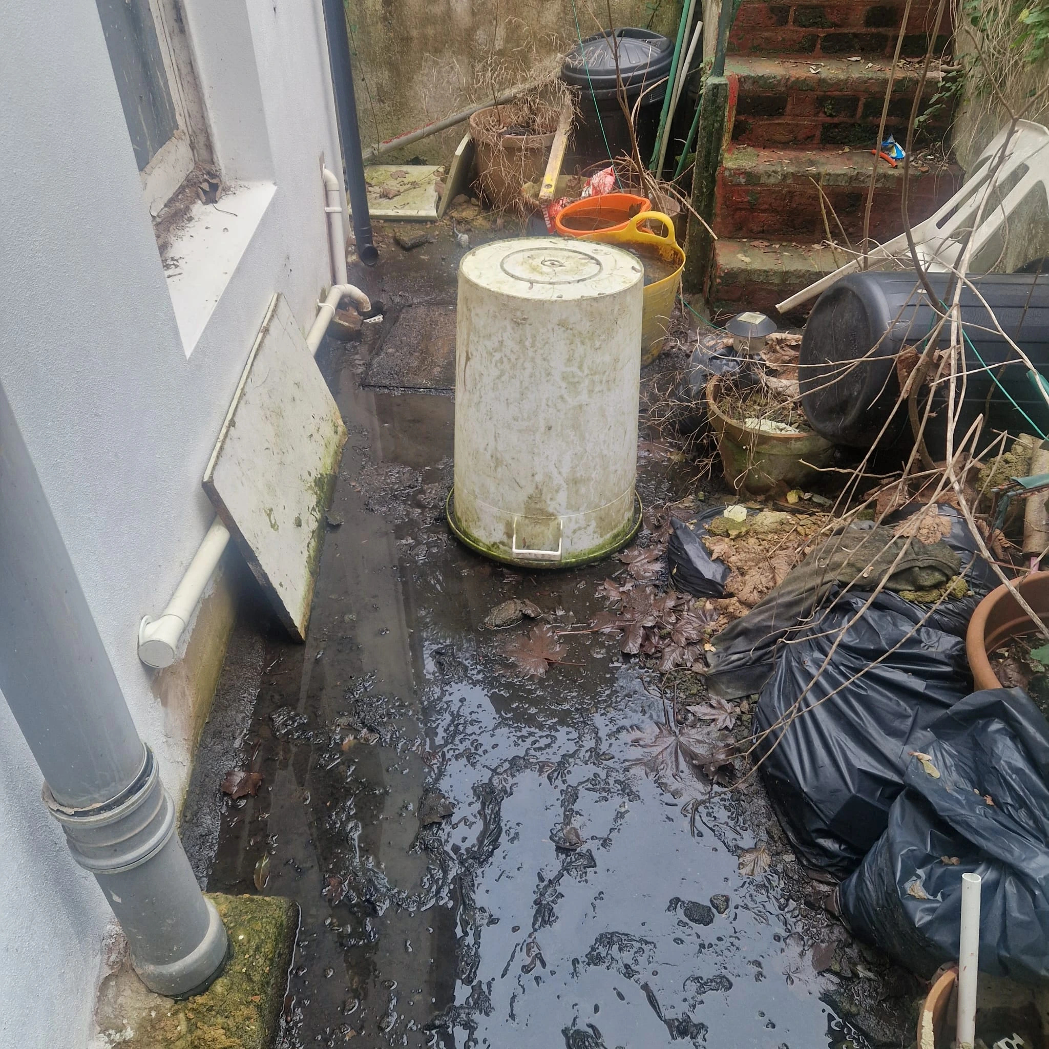 Thames Water Blocked Drain: Who Pays and What to Do First 10 Blocked channel drain receiving professional cleaning services in a Thames Water property