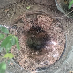 Engineer fixing blocked drain in Addington Title: Blocked Drain Addington Service – Drainage & Plumbing LTD