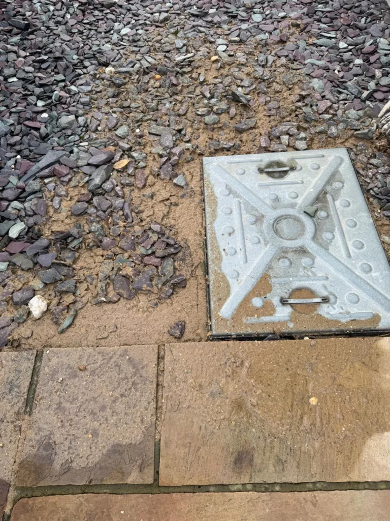 Drain services Sutton technician clearing a blocked drain with high-pressure jetting