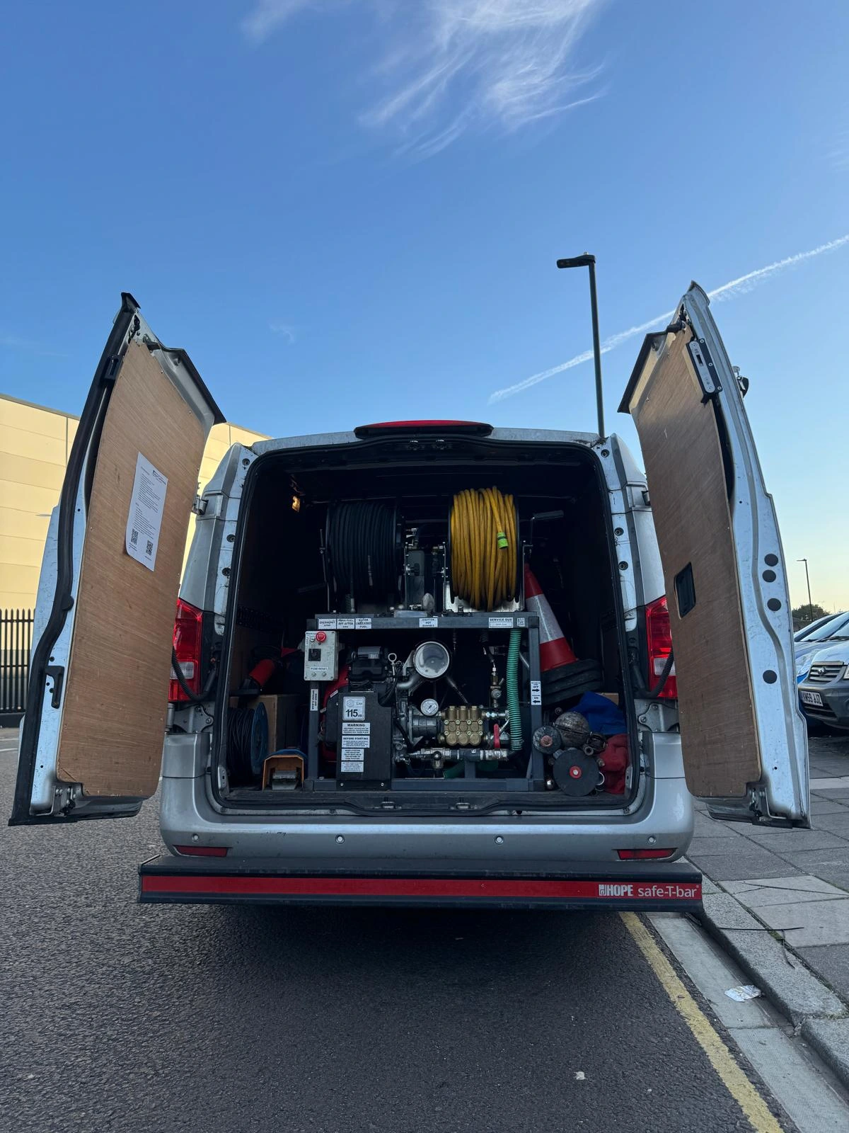 Blocked drain being inspected by local engineer in Purley residential area – highlighting common drainage issues in CR8 postcodes