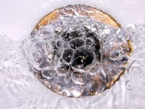 Fix a gurgling toilet or sink drain fast with Drainage & Plumbing LTD.