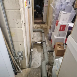 Local Addington drain experts inspecting a blocked drain by Drainage&Plumbing Ltd