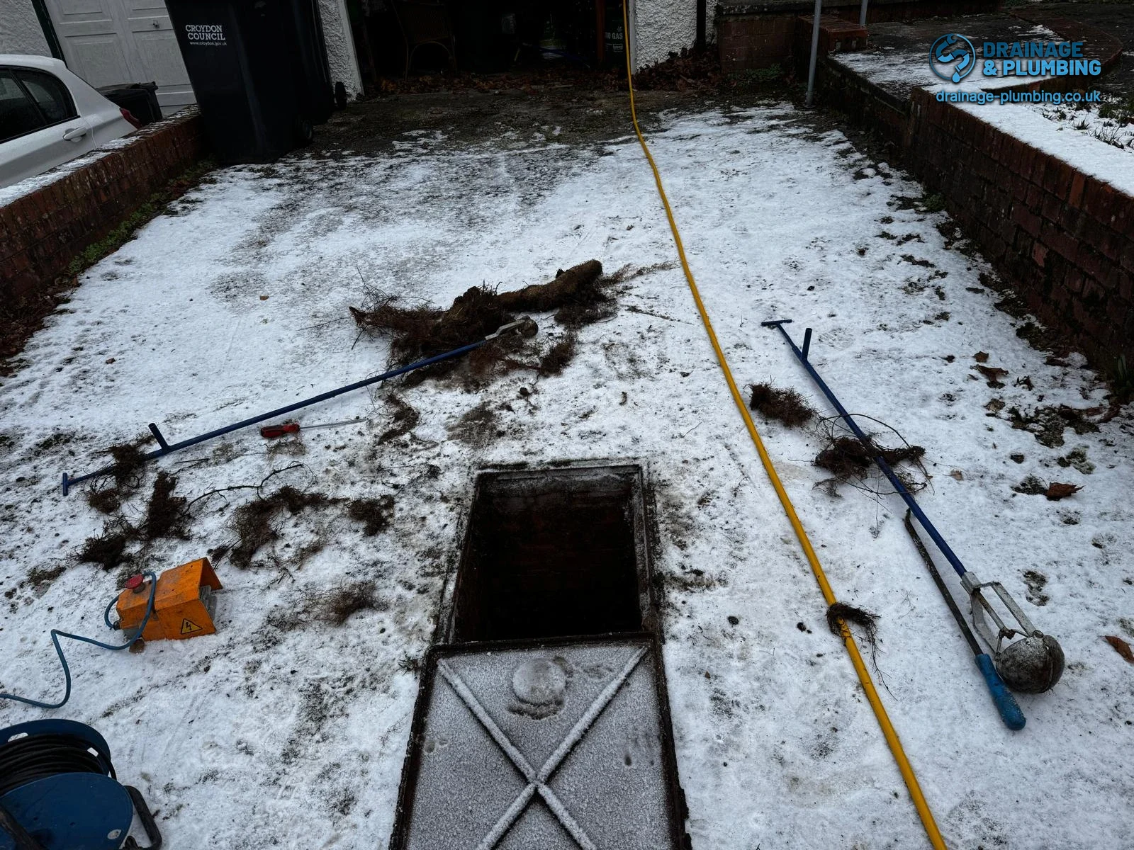 how to prevent blocked drains - grease and debris build-up inside a residential pipe in Banstead