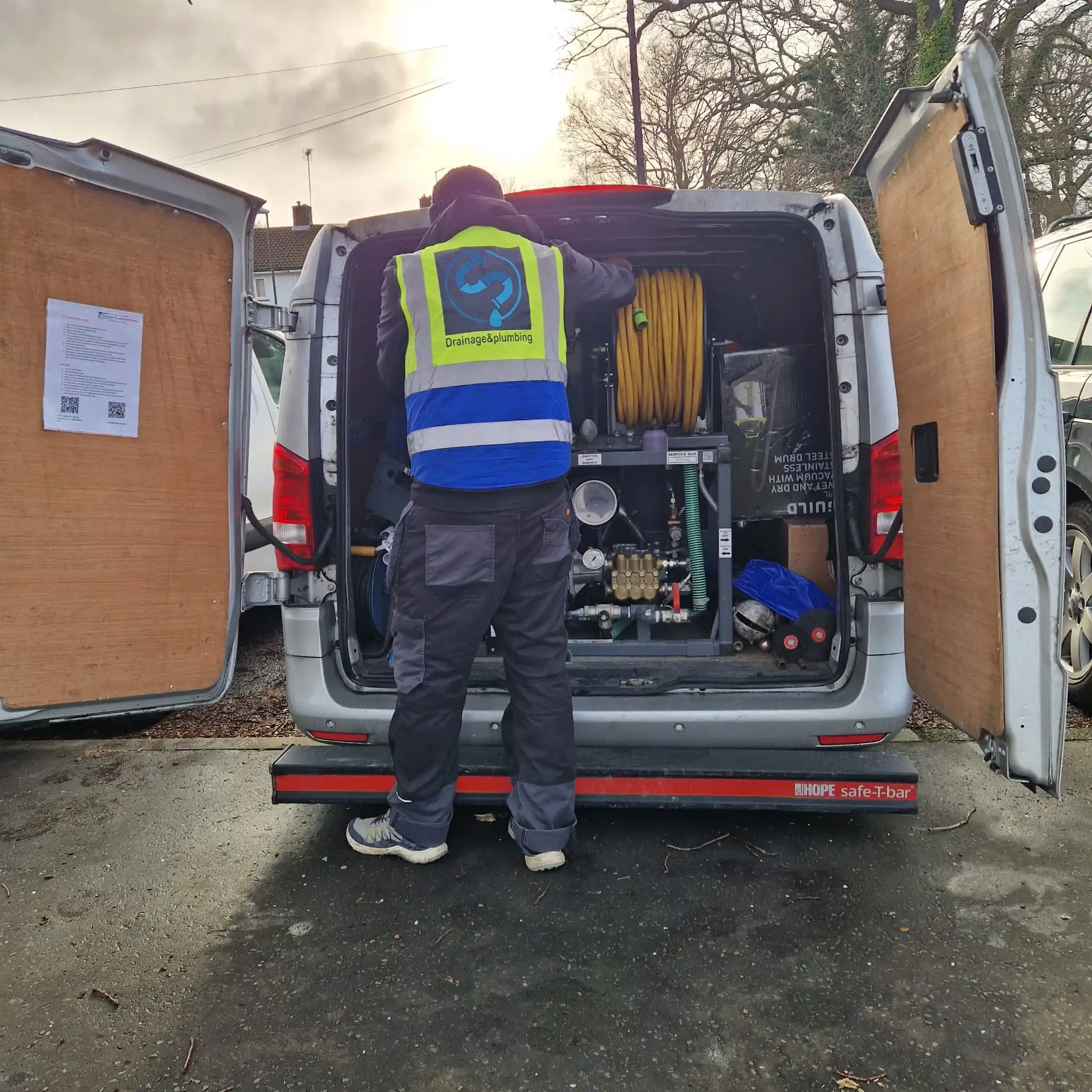 professional drain cleaning — high-pressure jetting equipment being used to clear a blocked drain in South East England