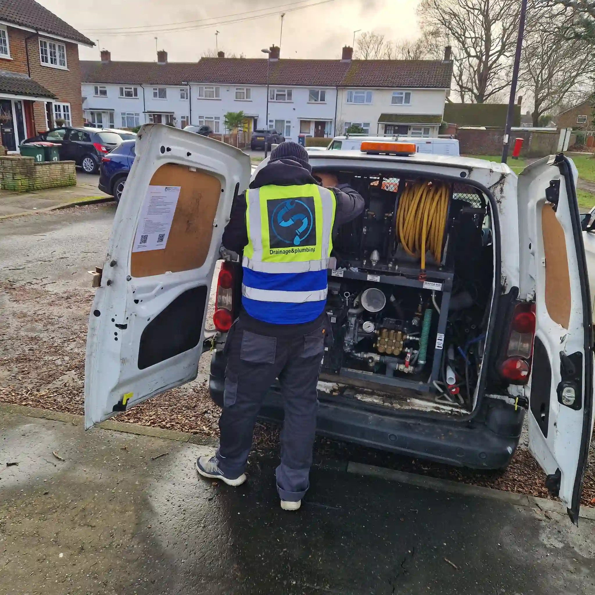 Emergency drainage response team preparing CCTV equipment for urgent rat infestation survey