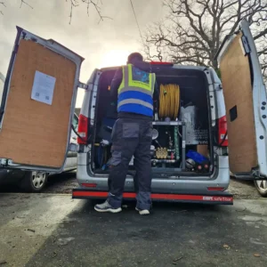 Drainage and Plumbing LTD branded van arriving for an emergency blocked drain call-out in South East England.