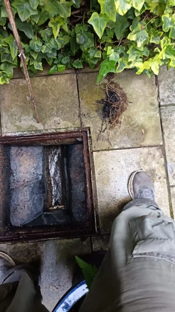 Drainage & Plumbing Ltd engineer clearing a severe blocked drain