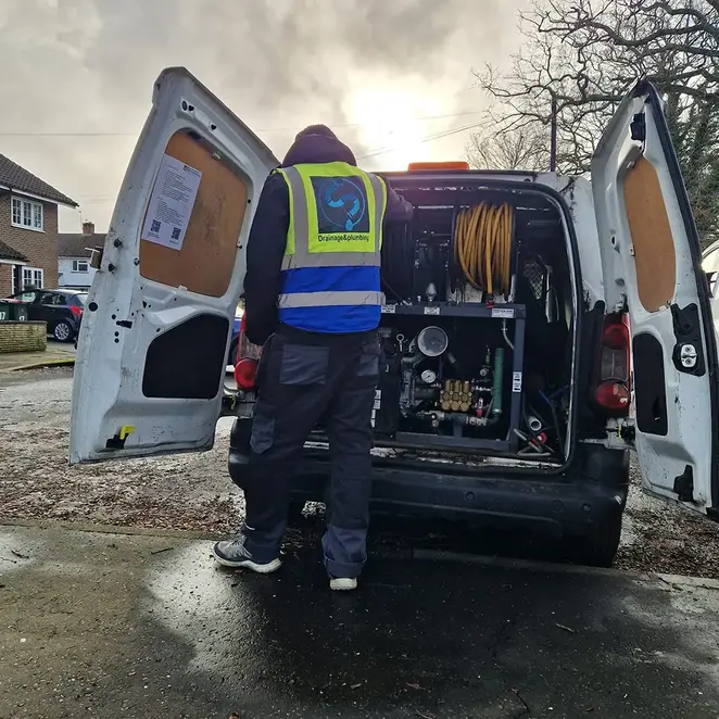 Home 1 Drain unblocking specialist clearing a blocked drain with high-pressure water jetting in South East England
