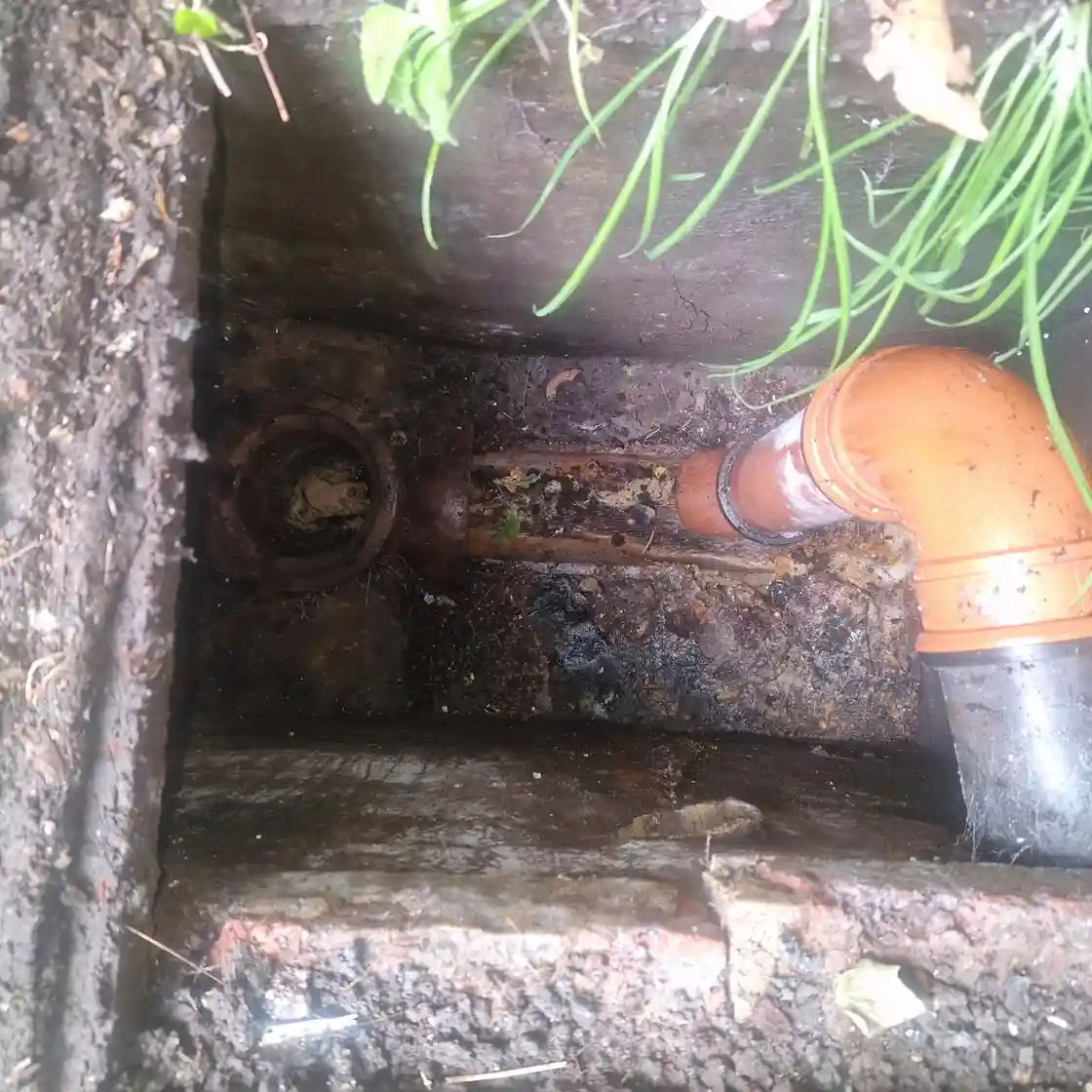 Drainage & Plumbing Ltd completing a professional drain clearance