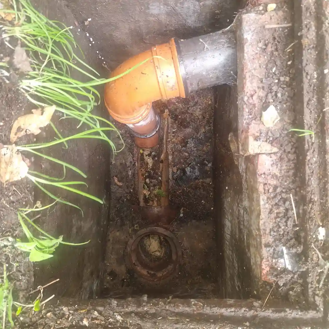 Open inspection chamber access for sewer line clean out and outdoor drain cleaning
