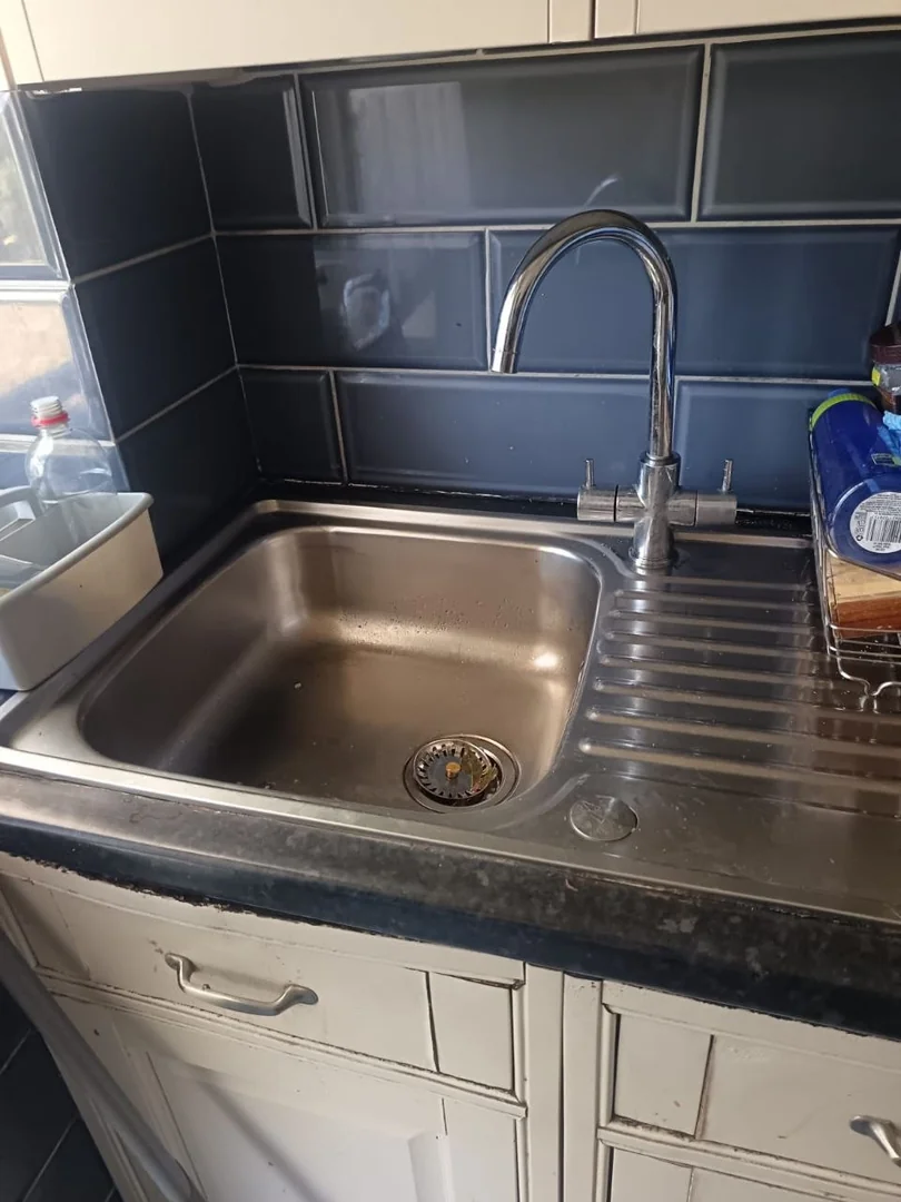 Jetting vs Rodding Drain Cleaning: Fast Fix, No Guesswork 10 High-pressure jetting hose clearing grease build-up inside a residential sewer pipe